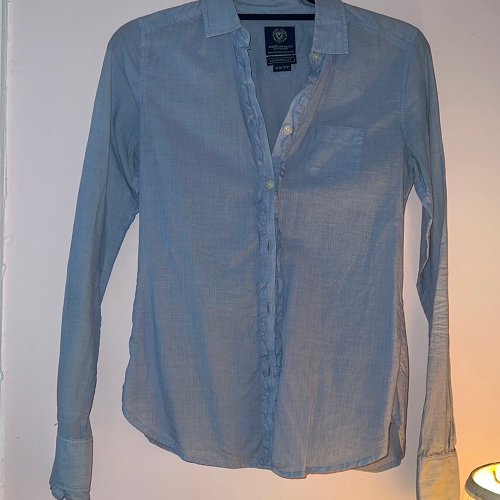 Blue ruffle front button down